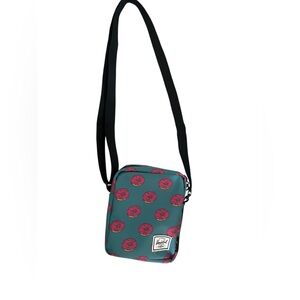 Herschel Simpson’s Teal Crossbody Bag with Pink Donut Print